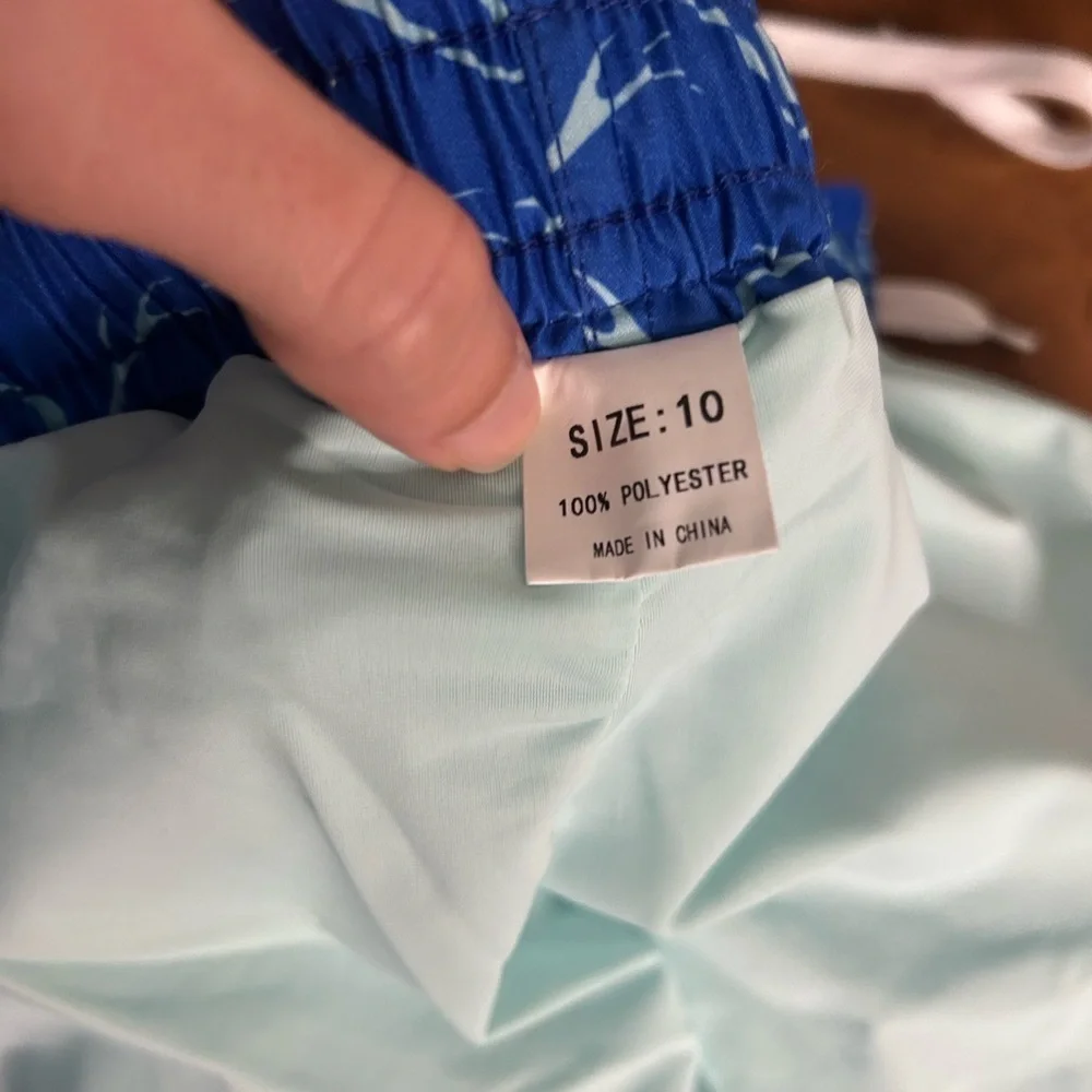 Boy’s Blue Wave Pattern Swim Board Shorts, Size 10